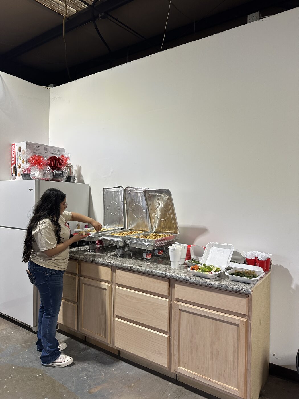 Guest serving food from a buffet at the B2B PM