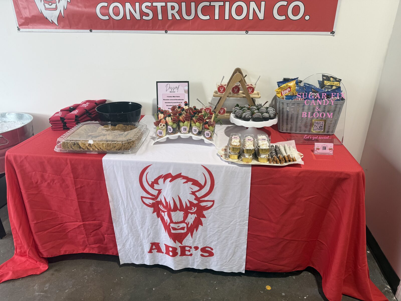 Abe's Construction Co. table with food and treats prepared for the B2B PM