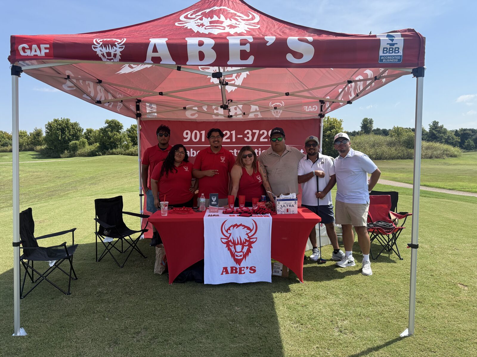 Abe's team at their tent during the DCLEAA golf tournament